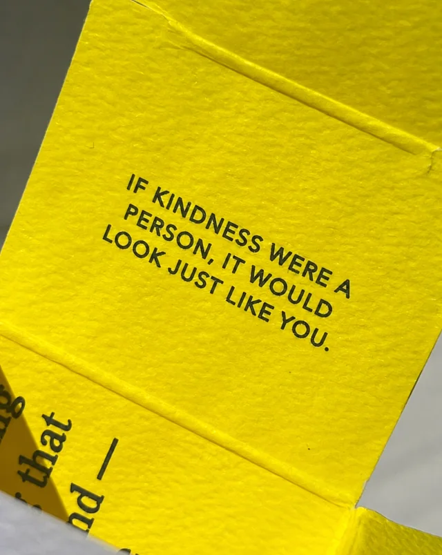 A yellow Beekman 1802 box reading: If kindness were a person, it would look just like you